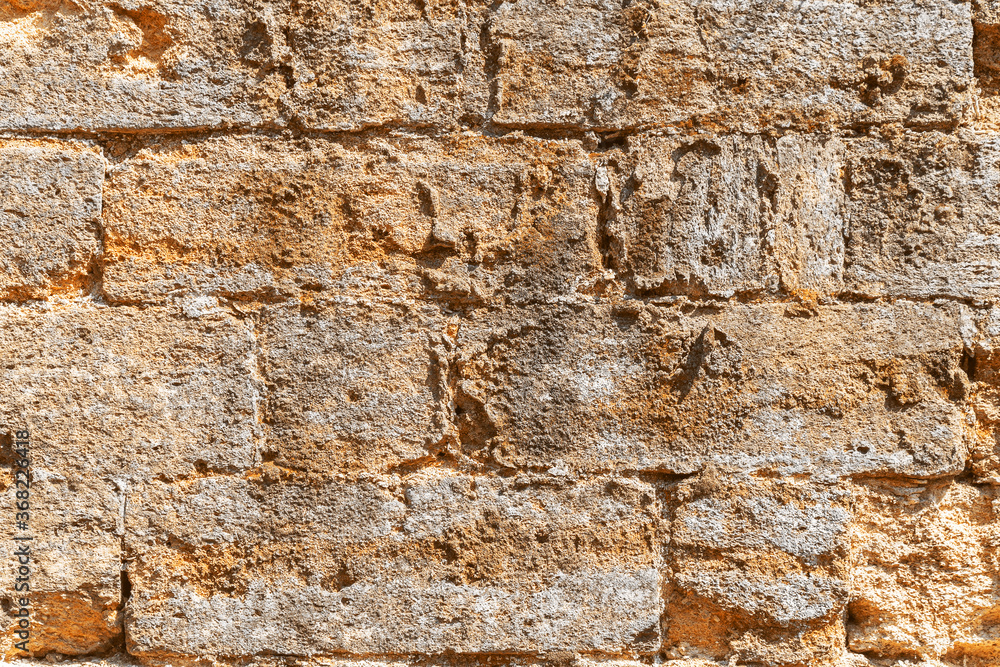 Wall built of natural stone. Can be used as background. Great background or texture. Wall built of natural stone. Can be used as background. Great background or texture.