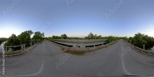 360 VR Old road bridge over the river at sunset. The virtual reality