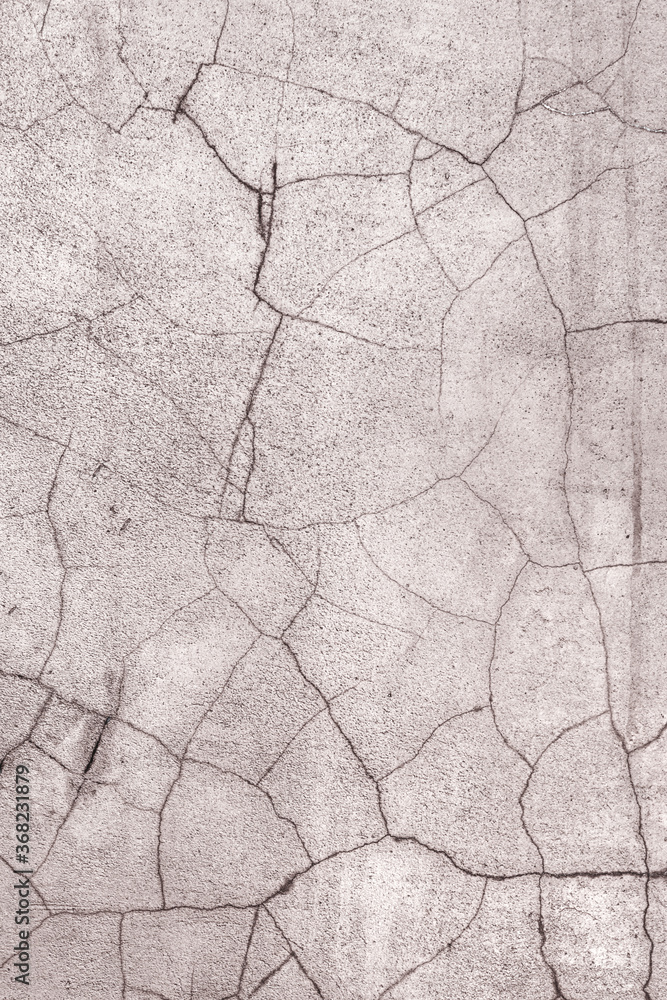 Abstract creative background of chaotic strokes of old cracked paint on concrete wall. Old surface with traces of paint, weathered, scratches and cracks for design Abstract creative background of chaotic strokes of old cracked paint on concrete wall. Old surface with traces of paint, weathered, scratches and cracks for design