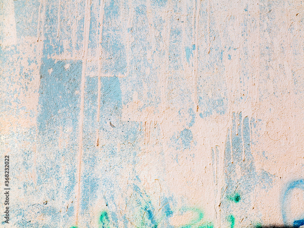 Abstract creative background of chaotic strokes of old cracked paint on concrete wall. Old surface with traces of paint, weathered, scratches and cracks for design Abstract creative background of chaotic strokes of old cracked paint on concrete wall. Old surface with traces of paint, weathered, scratches and cracks for design