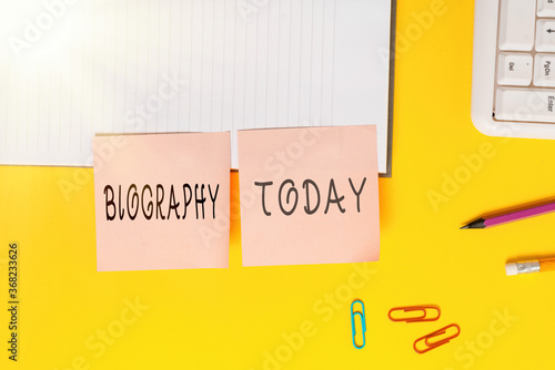 Word writing text Biography. Business photo showcasing an account of the life of something such as an animal, a coin, etc. Flat lay above table with blank papers with copy space for text messages photo