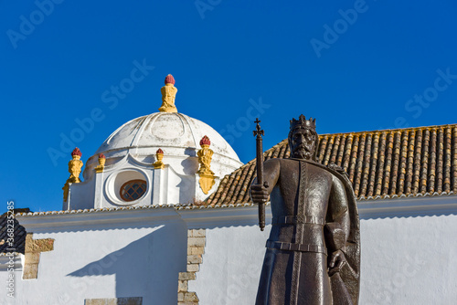 statue of king Afonso III  in front of Convent of Nossa Senhora da Assunção / Municipal Museum of Faro Faro, Algarve, Portugal photo