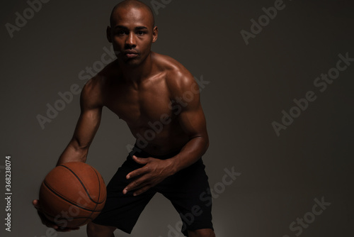 Fitness sports man playing basketball © Drobot Dean