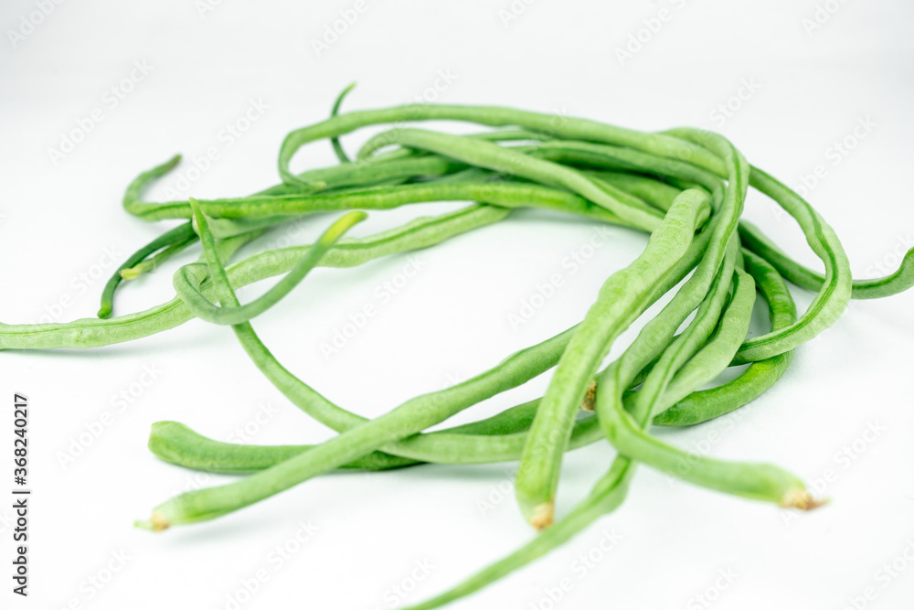 fresh long green beans isolated on white