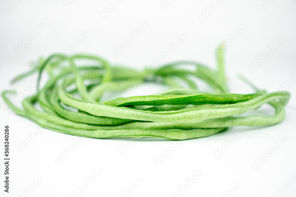 fresh long green beans isolated on white