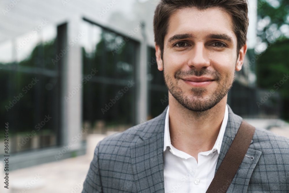 Fototapeta premium Business man outdoors near business center