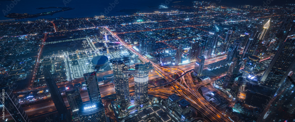 Commercial Building At Night In United Arab Emirates - obrazy, fototapety, plakaty 