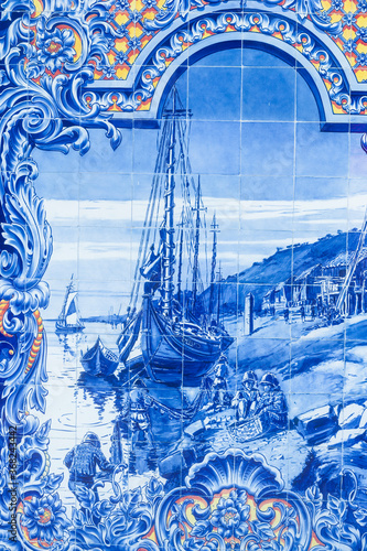 Tablou pe pânză Portuguese Azulejos depicting typical regional scenes and monument on the facade