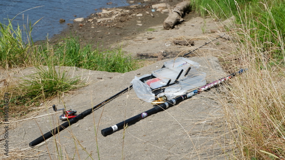 fishing rods on the shore