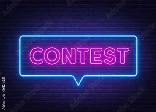 Contest neon sign in speech bubble frame on brick wall background.
