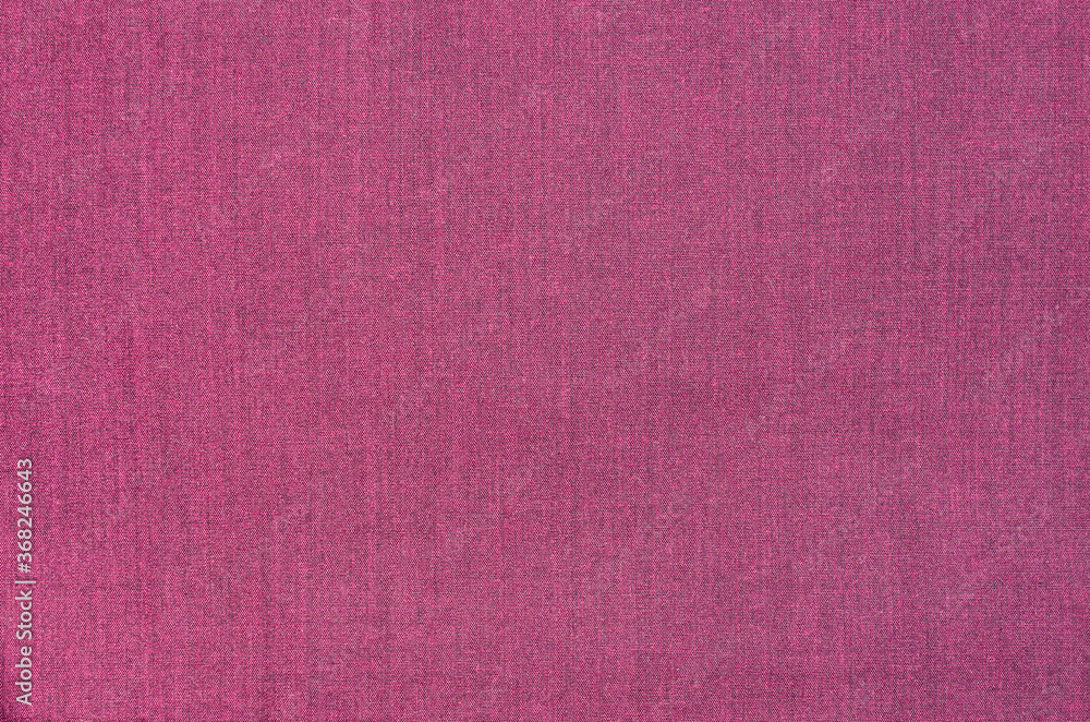 Fototapeta premium New burgundy woven fabric close up