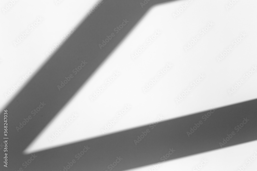 Shadow overlay effect for photo. Geometric shadow from a window or door on a white clean wall in clear weather. Geometric composition shadow Shadow overlay effect for photo. Geometric shadow from a window or door on a white clean wall in clear weather. Geometric composition shadow