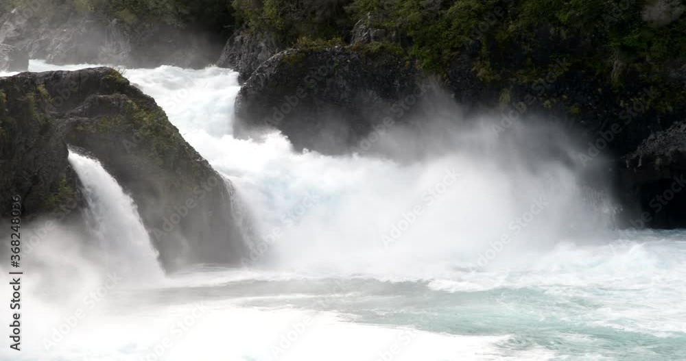 Roaring waterfall on the Petrohue River in the Patagonia region of southern Chile Roaring waterfall on the Petrohue River in the Patagonia region of southern Chile