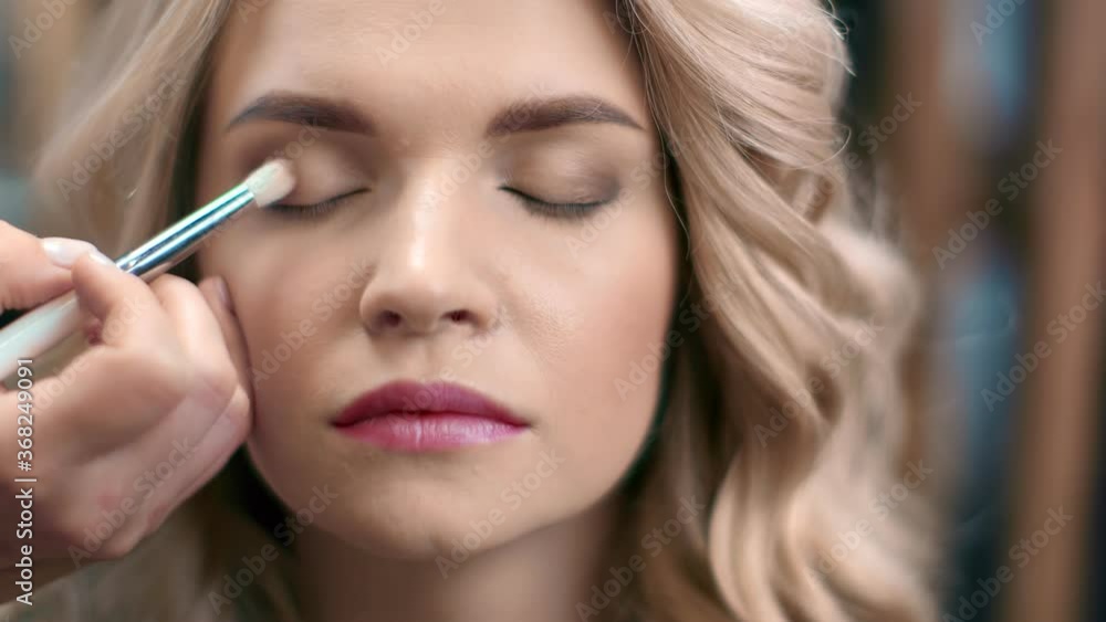 Extreme close up face of female model during eyes visage. Shot on RED Raven 4k Cinema Camera Extreme close up face of female model during eyes visage. Shot on RED Raven 4k Cinema Camera