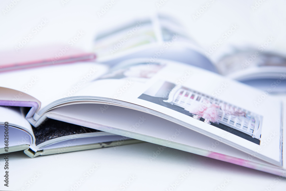 Albums with photos. Photo books on white background. 