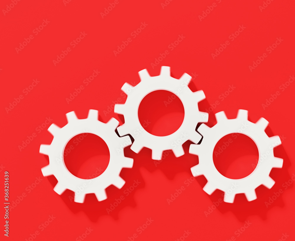 Three white connecting gear cogs in motion blur isolated on red background; flat lay, close up, top view 3d rendering, 3d illustration Three white connecting gear cogs in motion blur isolated on red background; flat lay, close up, top view 3d rendering, 3d illustration