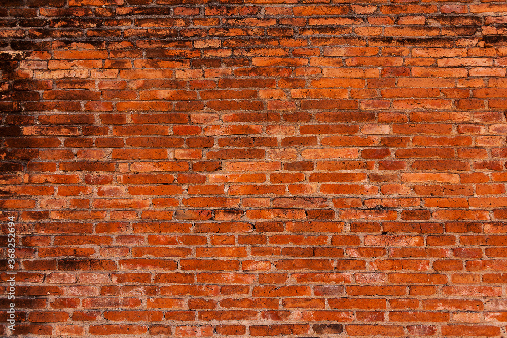 Naklejka premium Red brick wall texture for background