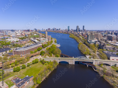 Aerial view of Cambridge on the left and Boston on the right connected by Harvard Bridge from Charles River, Boston, Massachusetts MA, USA. 