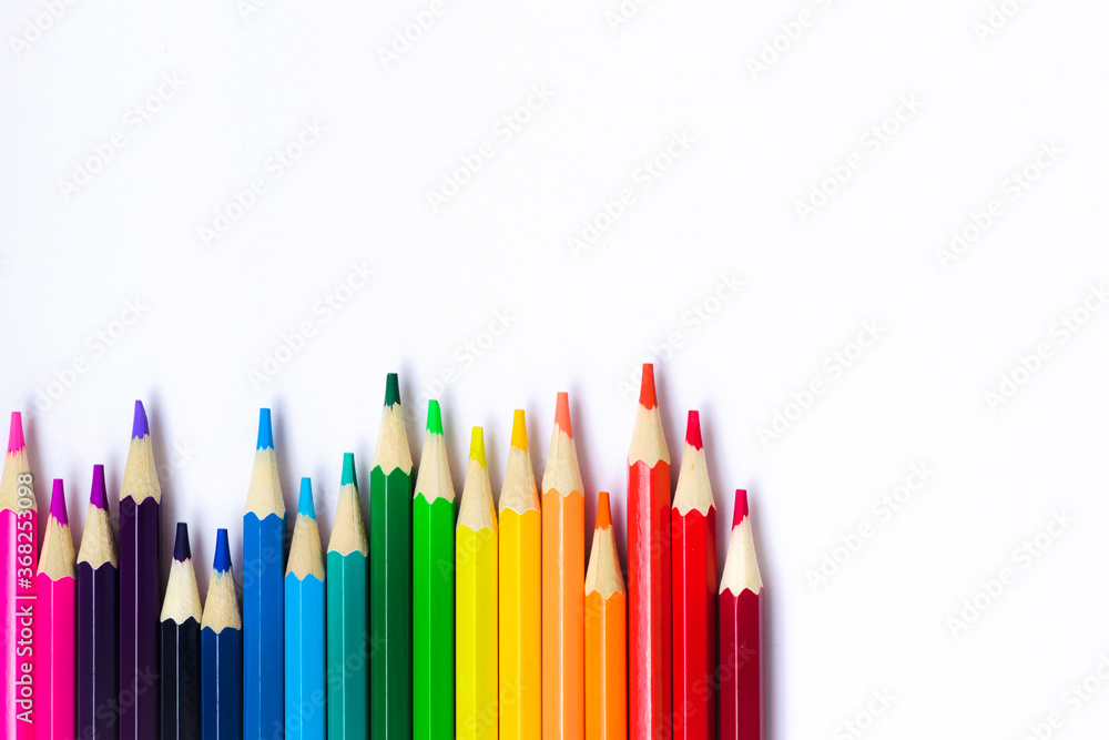 Colored pencils on a white background. Stationery. Colored pencils on a white background. Stationery.