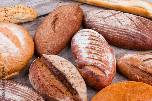 Organic bread background. Natural bread assortment. Bread in bakery shop.