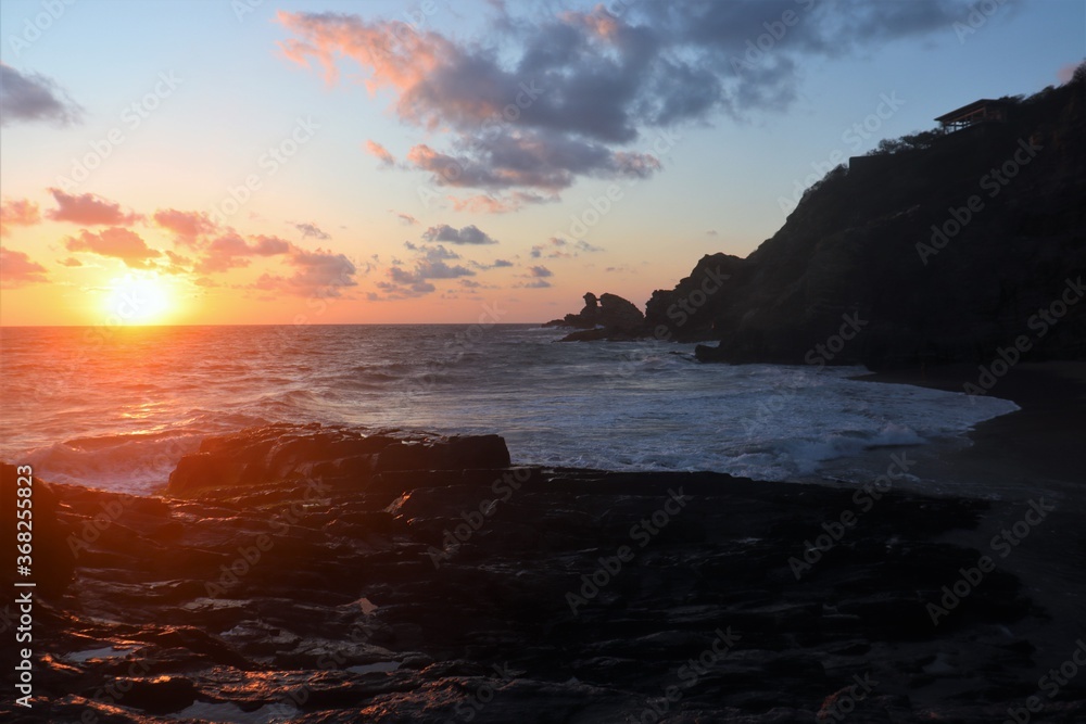Sunset at the rocky coast of oaxaca