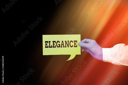 Word writing text Elegance. Business photo showcasing scientific precision, neatness, and simplicity of something Displaying Empty Sticker Paper Accessories Smartphone With Medical Gloves On photo