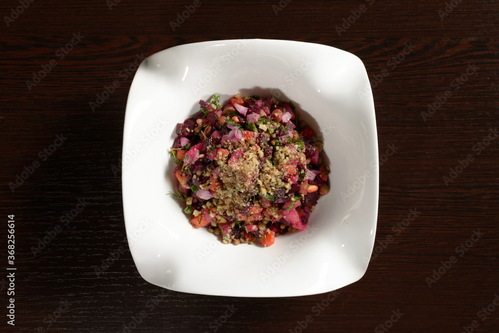 Delicious and healthy vegetable salad vinaigrette, top view. Photos for restaurant and cafe menus Delicious and healthy vegetable salad vinaigrette, top view. Photos for restaurant and cafe menus