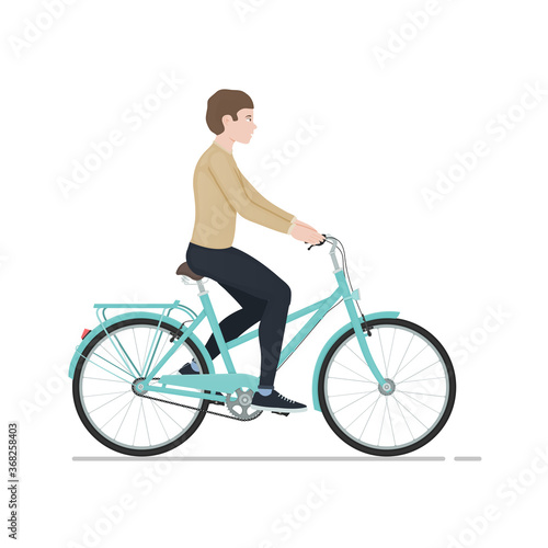 Young guy rides a bike isolated on white background