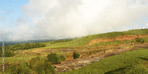 Dainthlen Falls And A Large Green Valley On The Mountain of Sohra or Cherrapunji In Meghalaya In India photo