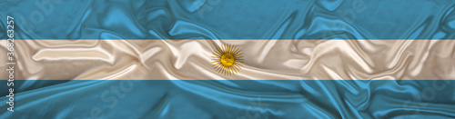 long panorama of the national flag of the state of Argentina on the texture of delicate silk with folds, the concept of historical, tourism, emigration, economy, politics, global world trade