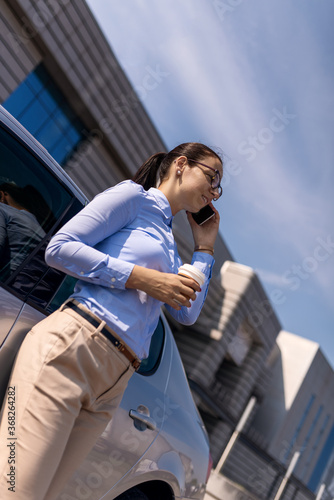 Close up portrait of a young business woman outdoors.