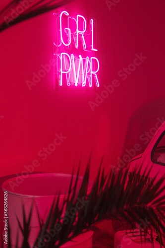 neon pink lamp with text 