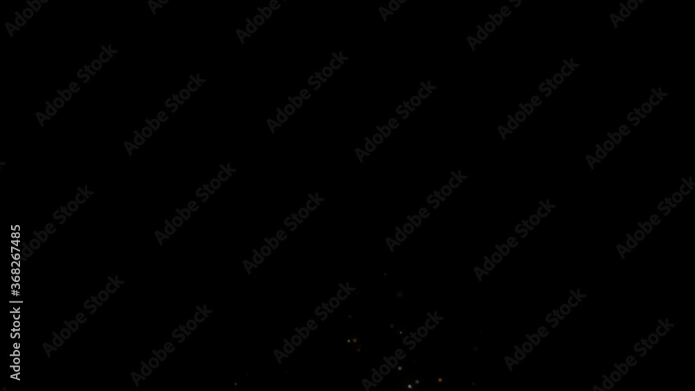Fast falling star with a brilliant scattering of round shape on a black background 4k Fast falling star with a brilliant scattering of round shape on a black background 4k