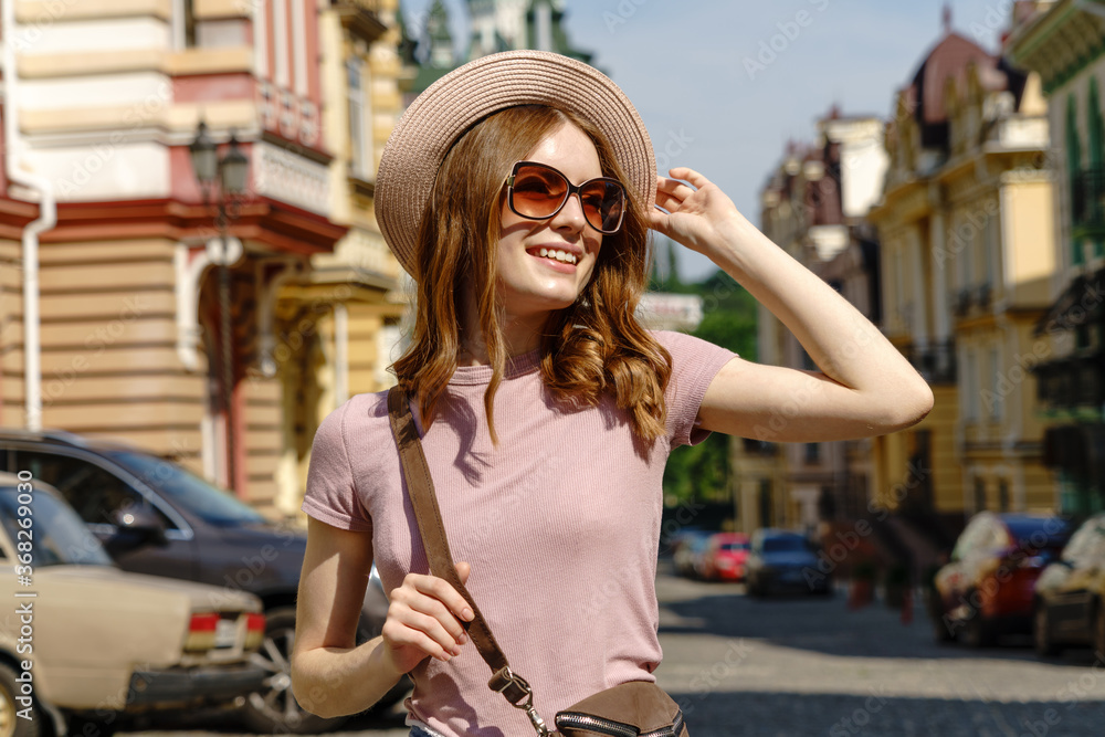 Beautiful Young Woman tourist Pleasant walk in the City Center