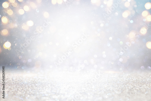 glitter vintage lights background. silver, gold and white. de-focused © tomertu