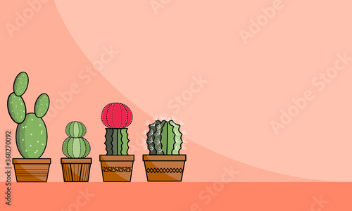 There’re colorful cactus in harden clay pots on the left corner. There’s copy space for your text on the right. 