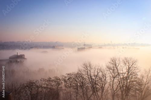 Aerials View To City In The Strong Morning Fog