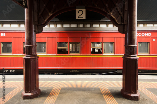 Heritage train carriages at a railway station photo