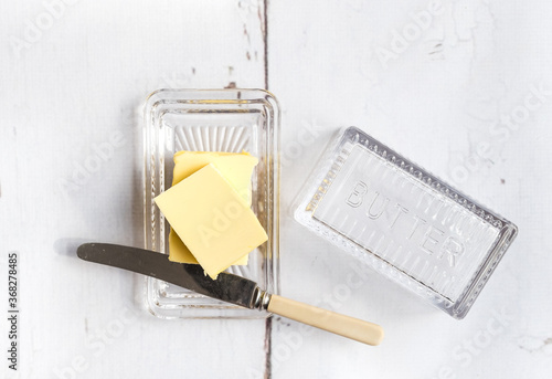 Fresh butter in a butter dish.