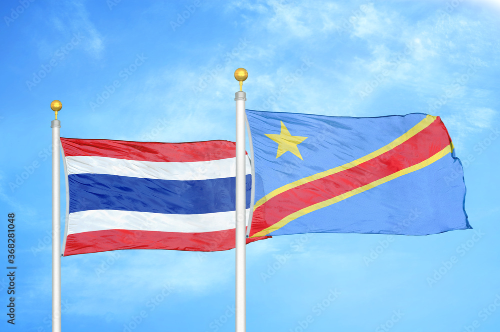 Thailand and Congo Democratic Republic two flags on flagpoles and blue sky
