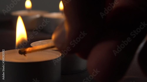 Lighting up three tealights from a row