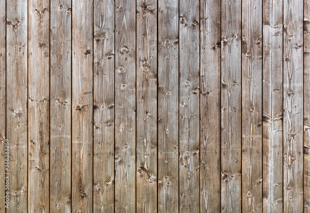 Wooden wall texture. Panel made of old wooden planks Wooden wall texture. Panel made of old wooden planks