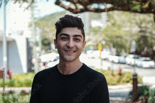 multicultural young adult man, university student photo