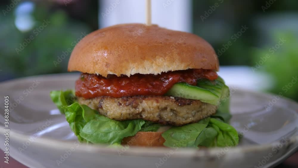 Vegan Burger on the plate. Fast food. Vegan Burger on the plate. Fast food.