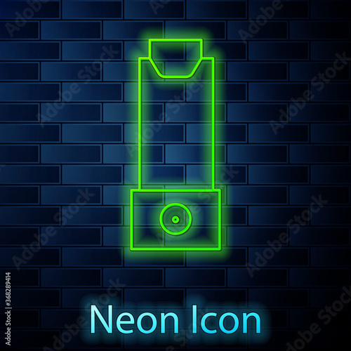 Glowing neon line Inhaler icon isolated on brick wall background. Breather for cough relief, inhalation, allergic patient. Vector Illustration.