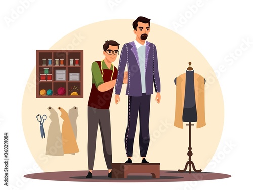 Tailor working on client costume at atelier shop