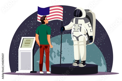 Man inspects stand with spacesuit of astronaut in astronomy museum