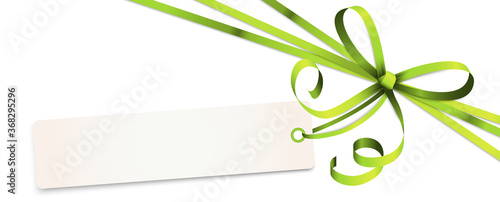 green colored ribbon bow with hang tag