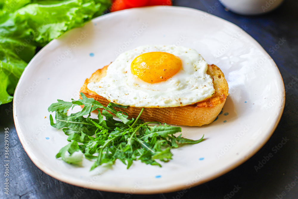 fried egg and toast bread salad delicious breakfast snack yolk and protein portion serving food background top view copy space eating healthy raw Takeaway fried egg and toast bread salad delicious breakfast snack yolk and protein portion serving food background top view copy space eating healthy raw Takeaway