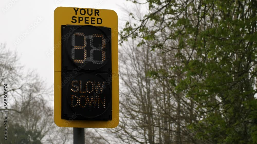 speed tracker monitor with display on road in british village speed tracker monitor with display on road in british village